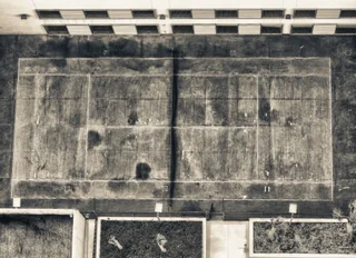 Aerial view of empty outdoor tennis courts